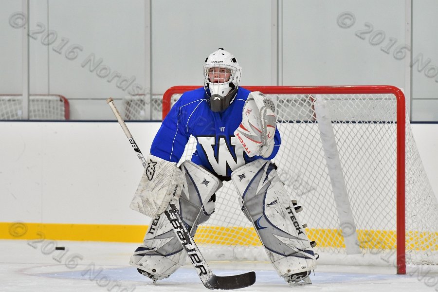 Wheaton College Men\'s Ice Hockey vs Middlesex Community College. - Photo By: KEITH NORDSTROM